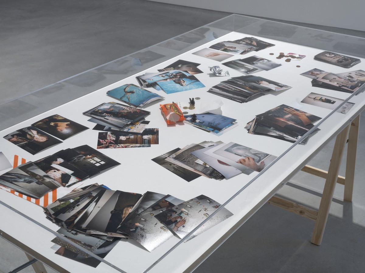Samuel Haitz, Archive (La Vie d'Artiste 2021-2022), 2022, 90 x 160 x 80 cm, table, acrylic glass, c-impressions and mixed media Picture: &copy; Julien Gremaud